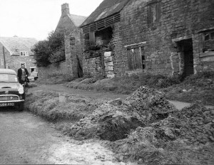 Water trench & Tumbledown buildings in the Square1965 WI