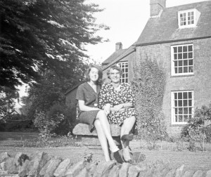 Shân Morgan with Lucy Eadon on the birdbath at The Vicarage 1963 or 64